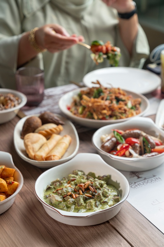 fresh lebanese salad and appetizers served at ghusoun restaurant